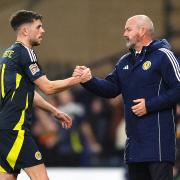 Scotland's Ryan Christie (right) shakes hands with head coach Steve Clarke after being substituted off during the UEFA Nations League Group A1 match at Hampden Park, Glasgow. Picture date: Friday November 15, 2024.