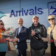 Bournemouth Airport welcomed their one millionth passenger of 2024. Lisa Gray and her partner Paul Gray were greeted by airport Managing Director Stephen Gill and Customer Service Director Cathy Hicks as they disembarked their flight from Faro.