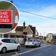 LIVE: Heavy traffic as level crossing barriers are stuck