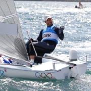 FOURTH GOLD: Ben Ainslie celebrates at the end of today's Finn medal race