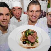 CHAMPION: Winner of the Christchurch Food Festival Young Chef of the Year competition, Jack Stoner, centre, with his winning dish and runners-up, from left, Ryan Proudley, Raymond Pang and Ryan Carpenter