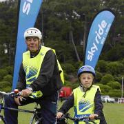 ON THEIR BIKES: Cllr Dennis Gritt and grandson Ollie Gritt. Left, Ian Kalra, transportations services manager