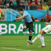 LATE PAIN: Luis Suarez breaks England hearts