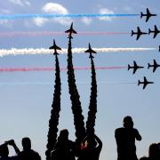 A potential operator wants to host the air show for 10 years