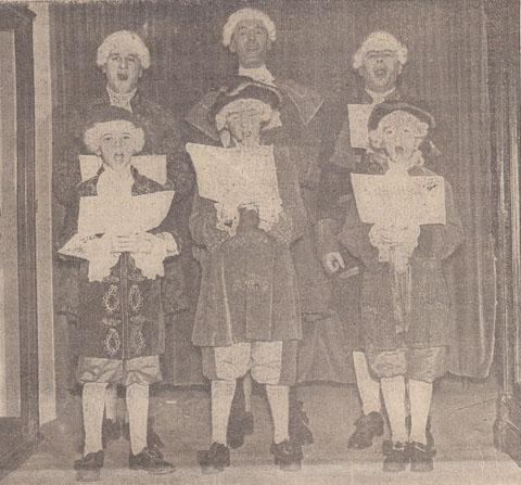 December 1937: members of St Michael's Choir who sang carols daily throughout the week just before Christmas in Brights Restaurant, Bournemouth.