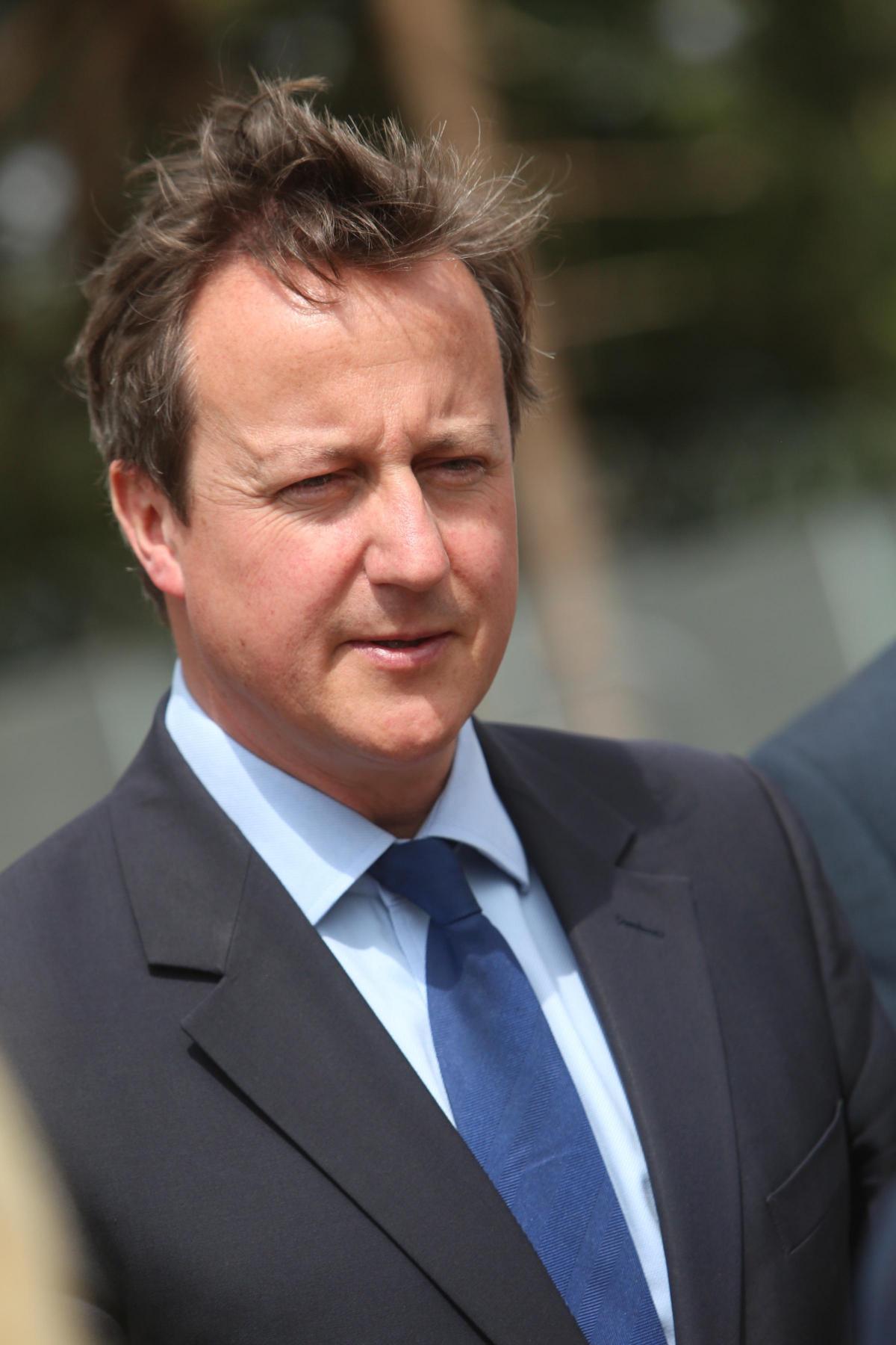 Prime Minister David Cameron and Chancellor George Osborne visit the Royal Marines base in Poole on Friday August 1, 2014