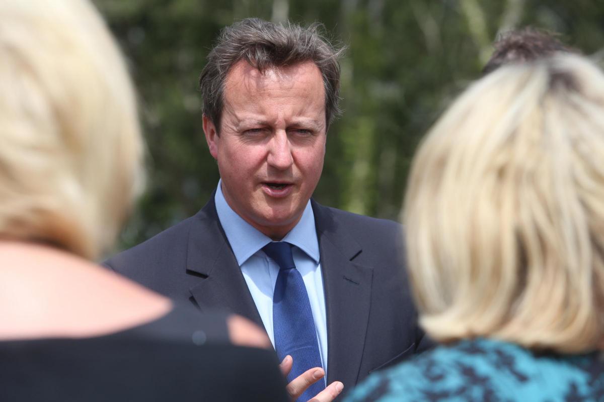 Prime Minister David Cameron and Chancellor George Osborne visit the Royal Marines base in Poole on Friday August 1, 2014