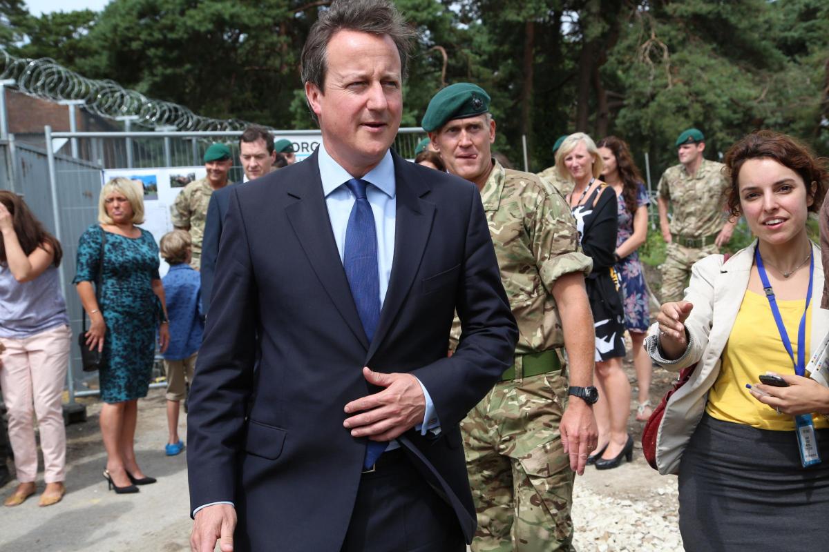 Prime Minister David Cameron and Chancellor George Osborne visit the Royal Marines base in Poole on Friday August 1, 2014