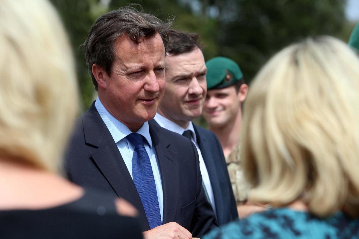 Prime Minister David Cameron and Chancellor George Osborne visit the Royal Marines base in Poole on Friday August 1, 2014