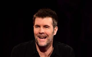 Rhod Gilbert reveals cancer diagnosis and tells fans he is 'disappearing for a while'. (PA)