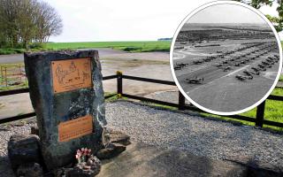 The memorial now at the site of the former airfield's main gate