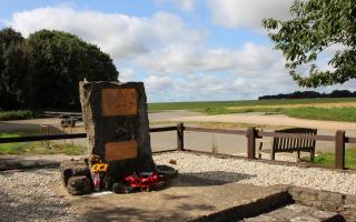 Memorial stone at the entrance to Trrant Rushton airfield. (Photo: Edward Griffiths)