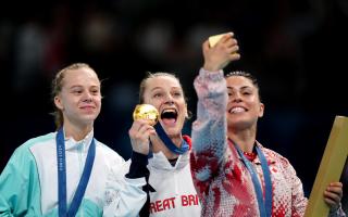 Bryony Page, centre, won gold in Paris