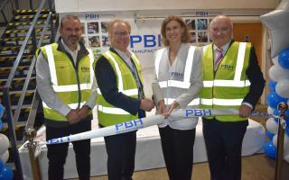 Jessica Toale, Bournemouth West MP, officially opens the new PBH Manufacturing site with (left to right) Chris Elms, General Manager; Martyn Bright, Managing Director, and Mike McKenna, Chief Executive.