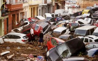 At least 95 people have been killed after flash flooding swept large areas of Spain.