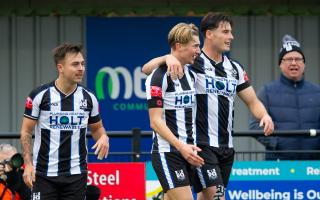 Goals from Matty Burrows (centre) and Jack Lovell weren't enough as Wimborne lost 3-2 to Marlow. File photo.