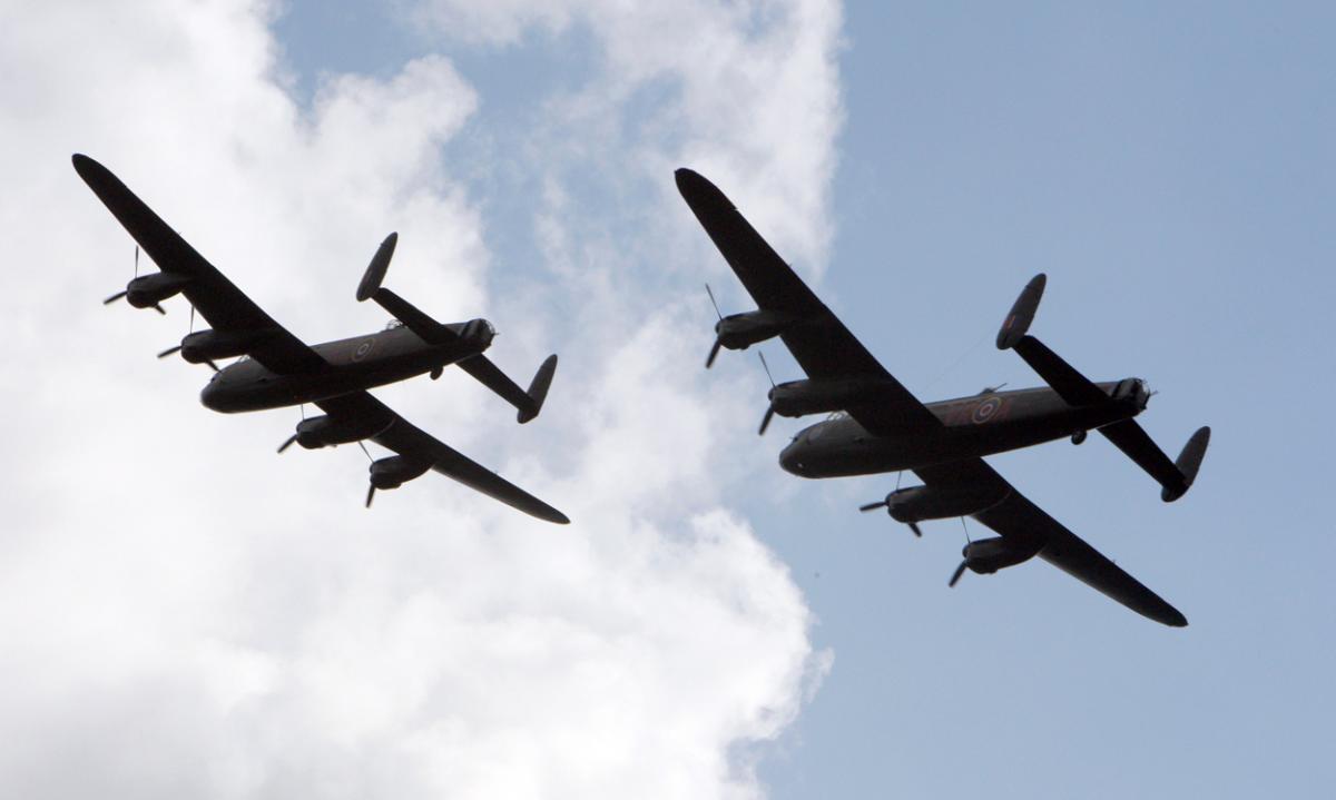 The world's two airworthy Lancasters fly in to Bournemouth Airport. Photos by Richard Crease. 