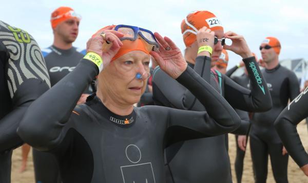 Swimmers taking part in the Poole Open Water swim  off  Sandbanks beach.