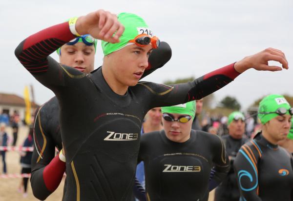 Swimmers taking part in the Poole Open Water swim  off  Sandbanks beach.