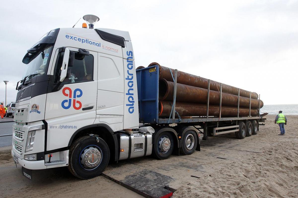 The 700m pipe used to protect Poole's beaches from coastal erosion after the winter storms is removed from Canford Cliffs. Photos by Sally Adams. 