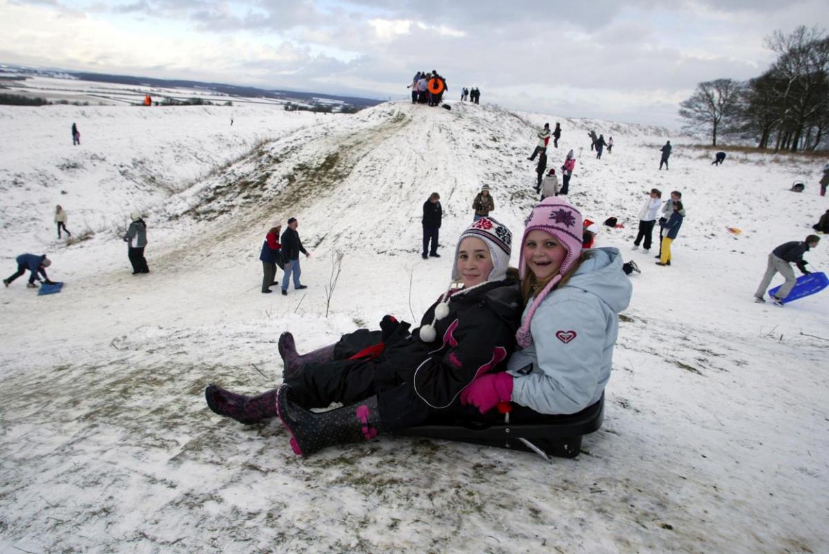 In 2009 Olivia Halford and Catherine Perry enjoyed tobogganing at Badbury Rings