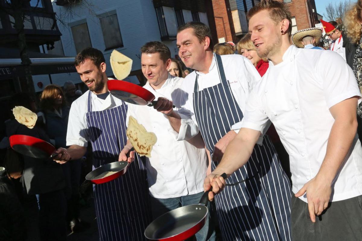 Pancake Day races take place in Christchurch on Shrove Tuesday. Pictures by Sally Adams.