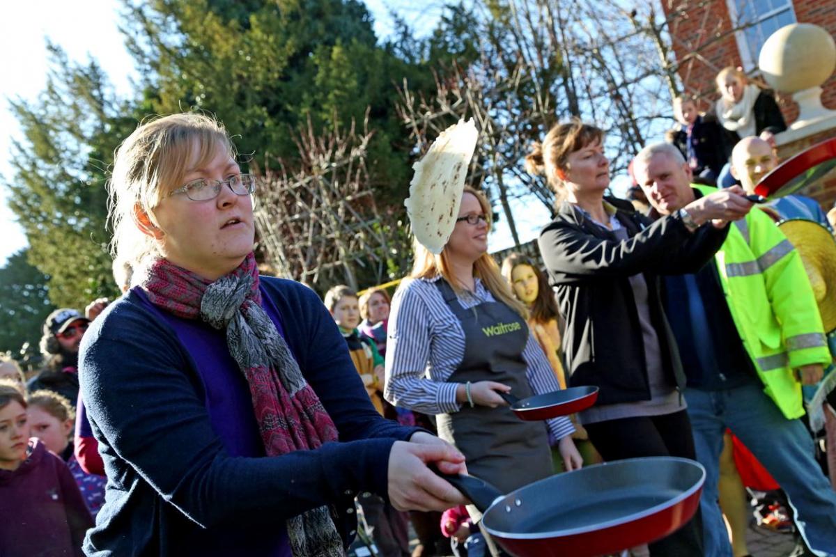 Pancake Day races take place in Christchurch on Shrove Tuesday. Pictures by Sally Adams.