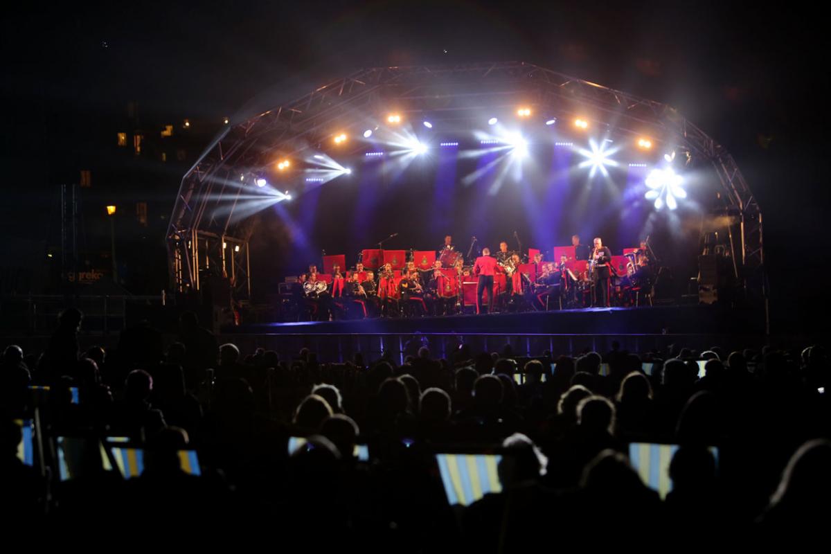 The HM Royal Marine's Band Collingwood perform at Boscombe Pier as part of the Night Air for Bournemouth Air Festival. 
