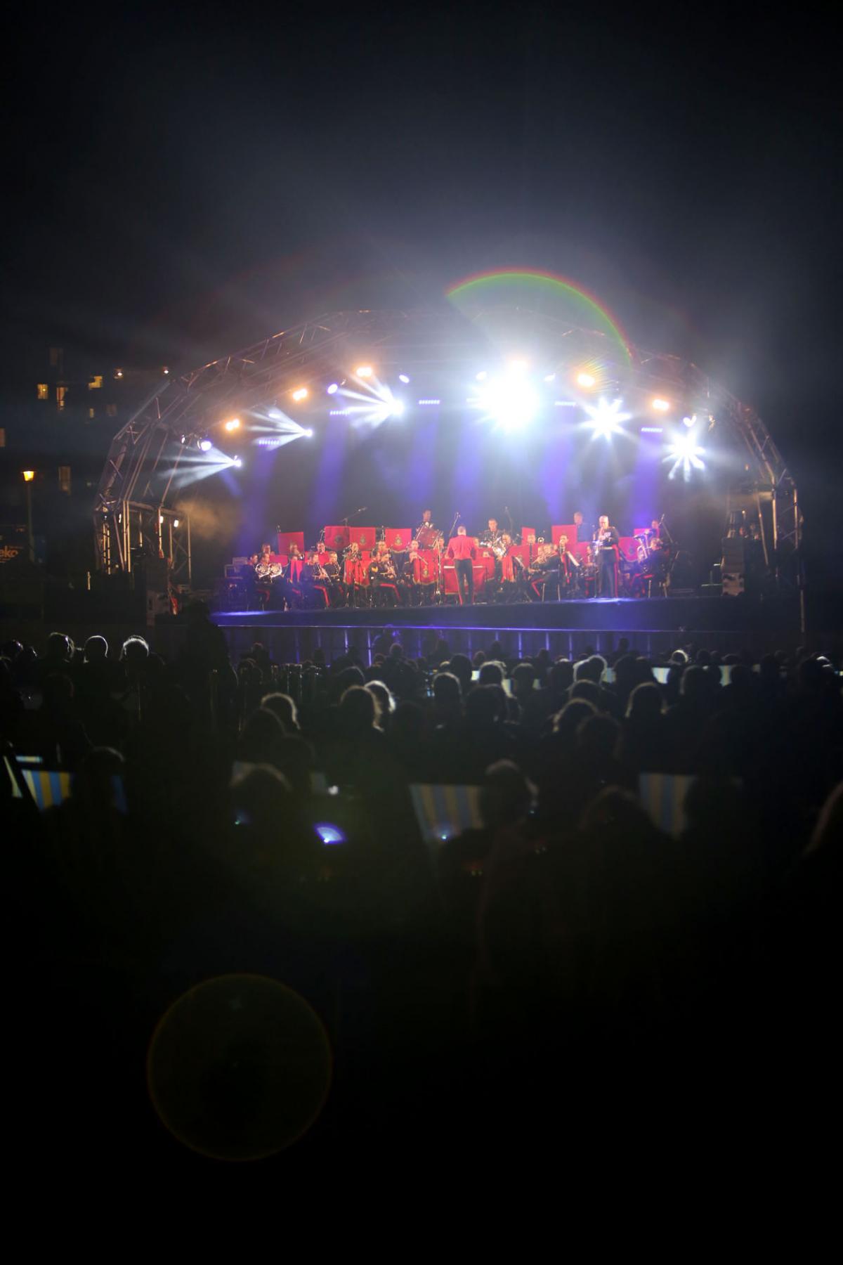 The HM Royal Marine's Band Collingwood perform at Boscombe Pier as part of the Night Air for Bournemouth Air Festival. 
